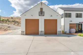 12 ft garage doors on the 900 sq ft detached garage. Driveway is now paved with asphalt.