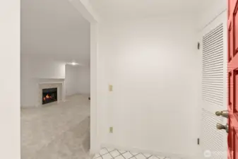 Opens into living/dining room, with bedrooms in back of unit.