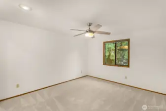 2nd bedroom with overhead fan.