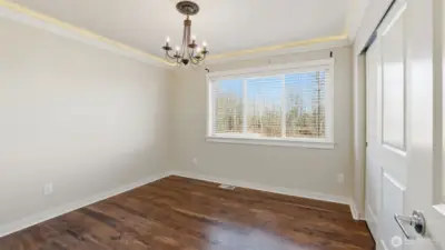 Bedroom on upper level offers inlaid lighting.