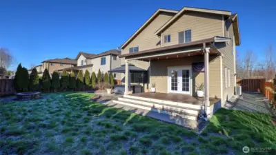 Convenient storage area on side of home w/large gate opening perfect for your toys and door leading directly in to garage.