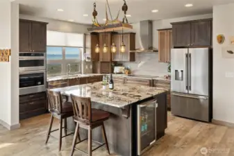 remodeled chef’s kitchen anchored by new KitchenAid appliances