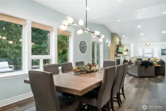 Open dining area flows effortlessly toward the living room, enhancing the home’s airy, open floor plan.