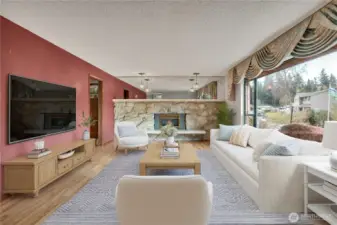 Spacious living area centered around a cozy fireplace—perfect for relaxing evenings or gathering with friends and family. **VIRTUALLY STAGED**