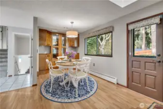 The dining room has built-ins and has enough space for a large dining room table. The skylight and picture windows flood the room with natural light! The perfect place for everyday meals or special occasion