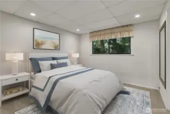 Private lower-level bedroom offers a quiet and comfortable retreat for guests. This would also be a great den/home office too! **VIRTUALLY STAGED**