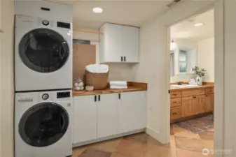 Just off the laundry is the enormous second bathroom located downstairs.