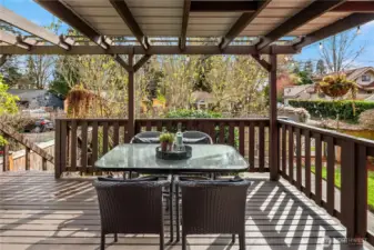 The back deck has this fantastic covered area perfect for barbecuing and dining even in the rain.