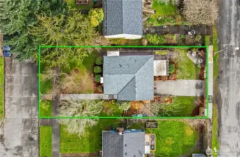 The overhead shot shows the street-to-street lot perfectly while also displaying the gorgeous yard & landscaping.