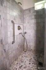 Gorgeous tile work in master shower