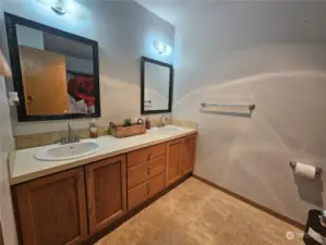 2 nd bathroom, double sink, bathtub, 2nd level.