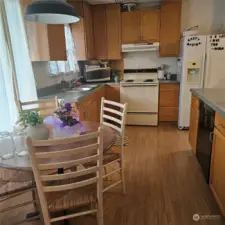 Good sized functional kitchen with eating bar