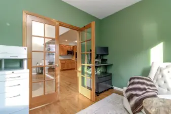 Office off the kitchen area with French doors.