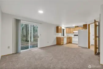 ~ Large dining area w/patio slider to backyard  ... Door on right is to laundry area & two car attached garage. ~