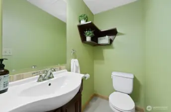 Half bath adjacent to the third bedroom.