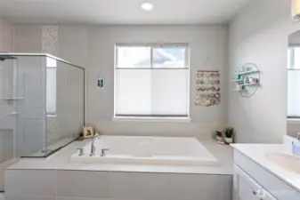 Soaking tub in primary suite