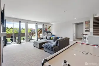 Sliding glass doors lead to your large yard