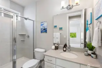Main floor full bathroom next to bedroom