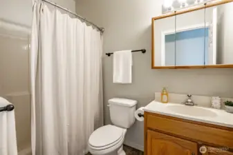 First floor full bath is adjacent to the bedroom.