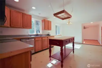 Spacious kitchen and breakfast nook and entry laundry and flex space.
