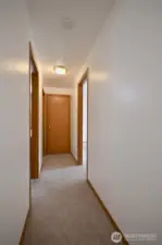 Hall leads to all the bedrooms on upper floor.