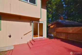 Back deck out dining, lets you have peek a boo views of the lake.