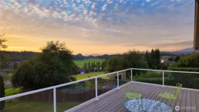 This view is amazing! Enjoy from throughout the home or on this spacious composite deck with unobstructed glass rail.