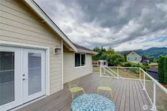 Back to the large deck with French doors that lead to the main floor open living space.