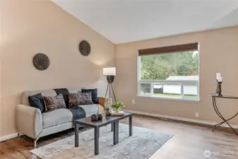 Living room with vaulted ceilings