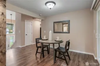 Dining room adjacent to kitchen with access to covered back deck