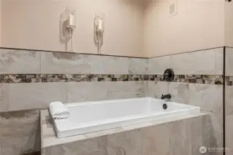 Primary bath with full shower and soaking tub
