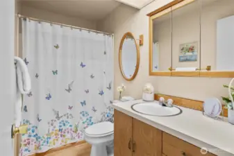 Shared full bath on second level.