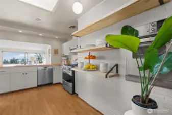 Create the kitchen of your dreams, adjacent to the fireplace room/formal dining room.