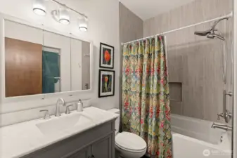 Full guest bath with tile surround