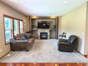 Family room w/gas fireplace & TV niche.