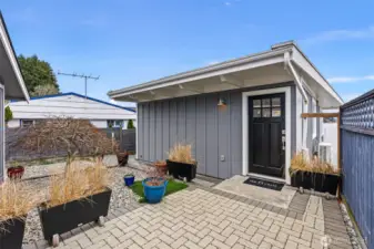 You will be immediately captivated by this home's charm and ambiance. A 400 sq. ft. 2-car garage is just to the left of this picture.
