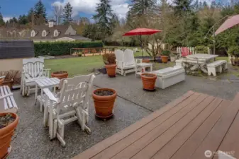 large patio with multiple seating areas - perfect for entertaining and dining al fresco