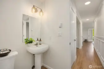 Lower level bathroom just outside of the bonus room has a shower/tub combo