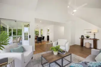 Both main floor living spaces flow out to the large, freshly painted wrap-around deck