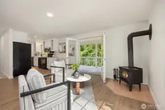 With a wood stove on the main floor and a pellet stove on the lower level, you'll have efficient supplemental heat and cozy vibes on demand