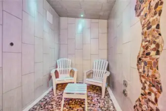 The steam room with shower and rain shower.