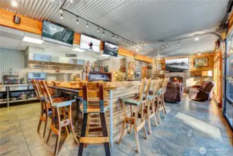 All the bar seating with the family room in the background.