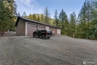 The huge 50x80 foot shop with 7 garage doors, 3 are drive through bays!