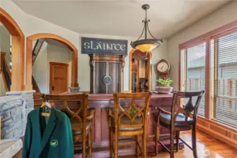 Formal dining (currently functioning as bar/cocktail space).  Arched detail and barrel ceiling which leads to butler & walk-in pantry....