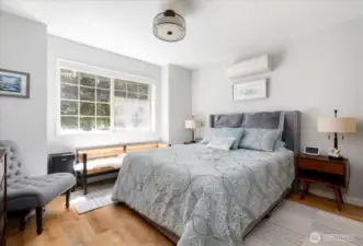 Front bedroom streaming with natural light.