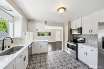 Kitchen updated in 2020. Quartz counters and stainless steel appliances.