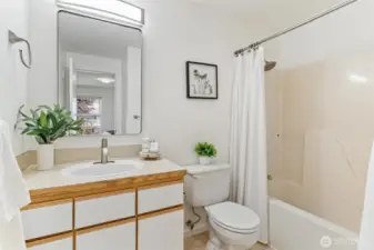 Primary bathroom with new mirror, light fixture and heat lamp