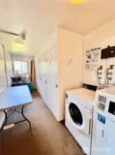Nice bright laundry room serves this floor of apartments.