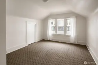 Upstairs primary bedroom #3.