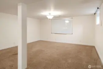 The apartment living room is open to the dining room.